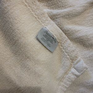 Peacock Alley Cream Throw Blanket